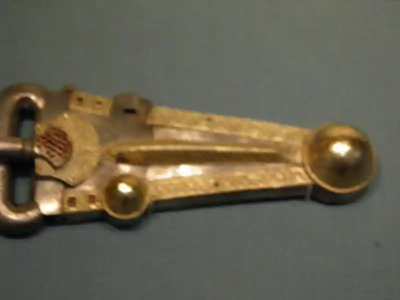 Belt buckle with solar disc design